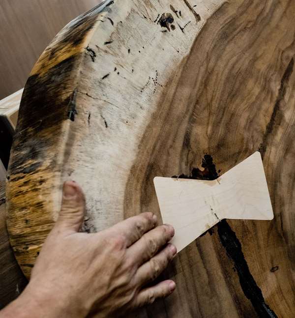 Quality custom furniture - Canal Dover Applying Butterfly To Live Edge Top