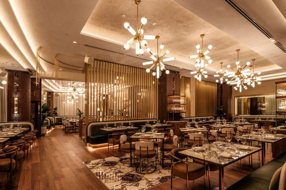 Custom upholstered banquette seating manufactured by Contraxx Furniture for 1587 prime steak house in Kansas City, demonstrating commercial hospitality seating for high-traffic fine dining environments.